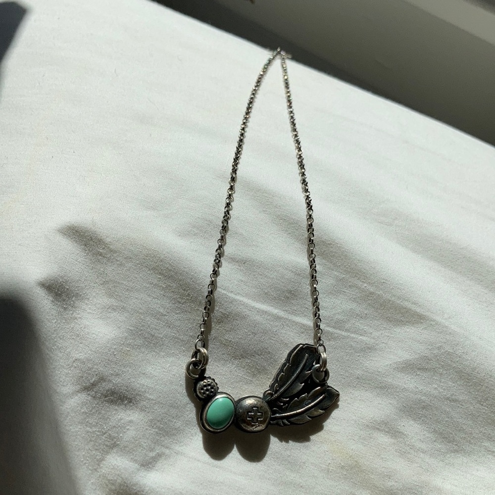 The noisy plume necklace!
